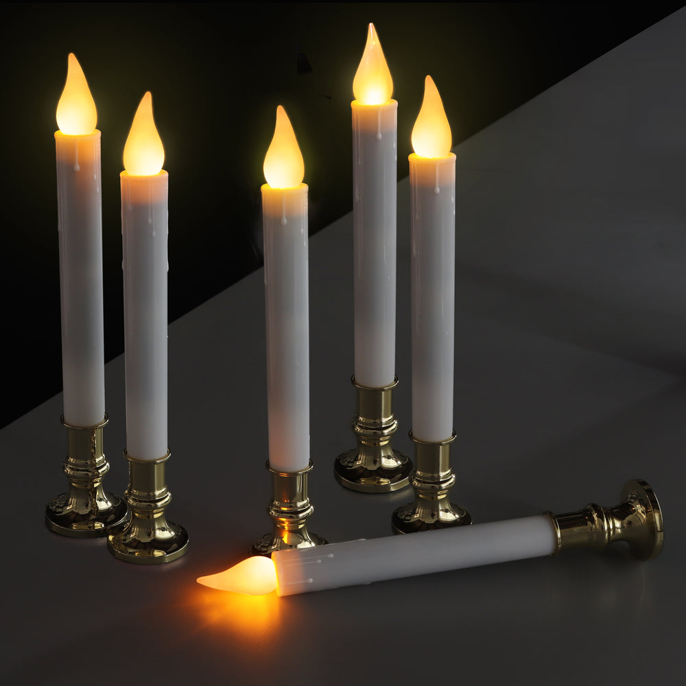 
                      
                        White taper with gold holders
                      
                    